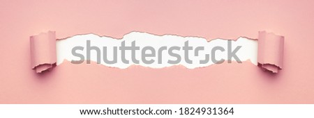 Pink torn paper for text or mockup. Minimal creative concept.
