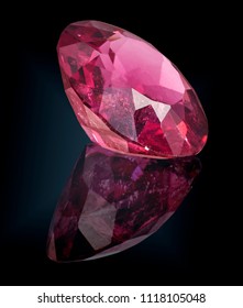 Pink Tourmaline Gem Stone Isolated On Black Background.