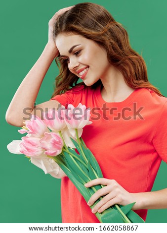 Pink T-shirt a bouquet of flowers and a beautiful woman