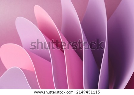 Pink and violet abstract shapes on a purple background. Elegant soft backdrop.