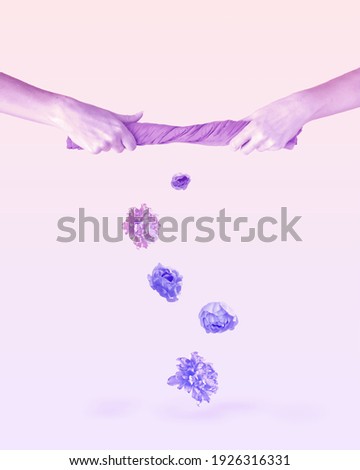 Pink violet blue flowers in full bloom falling out from cloth which squeeze beautiful young woman's hands. Minimal surrealism blooming art concept of gradient, holographic, neon colored background.