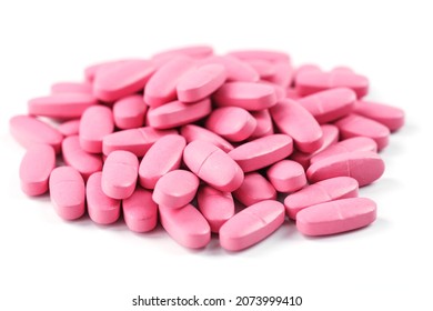 Pink Vitamin Pills For Women On A White Background. Multivitamins For Women's Health, Isolate, Free Space