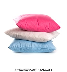 pink, white and blue pillows isolated on white background