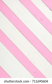 Pink And White Diagonal Slanted Striped Shiplap Boards With Room Or Space For Copy, Text Or Design. A Vertical Crop Background But Can Be Horizontal.  Faux Painted And Distressed Style That Is Trendy