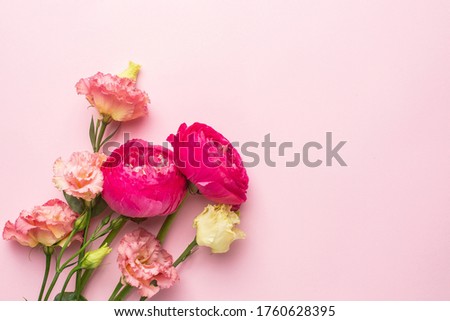 Pink and white flower bouquet on pastel background with copyspace