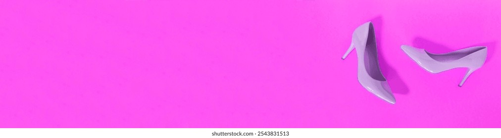 pink women's high-heeled shoes on a bright pink background. The concept of sales and advertising. flatly. From above. - Powered by Shutterstock