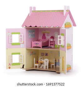 Pink Wooden Dollhouse Toy On White Isolated Background