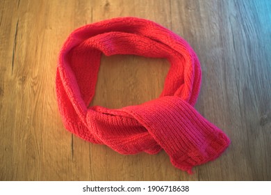 Pink Wool Scarf On Table