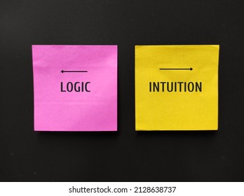 Pink and yellow note with text LOGIC and INTUITION point to different direction,  concept of choosing logic to make decision or follow instinct trusting intuition which valuable in some circumstance