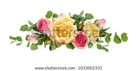 Pink and yellow rose flowers with eucalyptus leaves in arrangement isolated on white background. Flat lay. Top view.