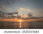 pinkish blue evening sky against the sea