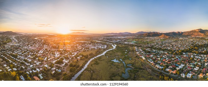 Pinkish blue sunrise over Townsville - Shutterstock ID 1129194560