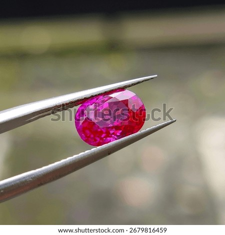 Pinkish Red Burmese Ruby Under Sunlight