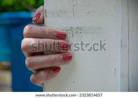 a woman and a child show their nail polish