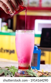 Pinky Ice Drink, Made From Strawberry Syrup, Soda And Milk. 