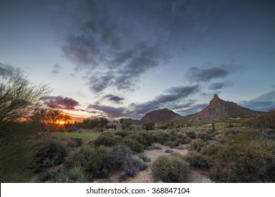 Pinnacle Peak Mountain In Scottsdale, Arizona  At Sunset Near A Golf Course 