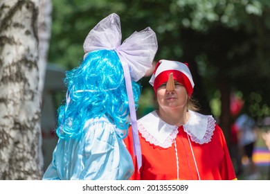 Pinocchio And Malvina In The Park. Russia, Salavat. 03.07.2021