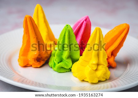 Pinoy Snack or Dessert- Meringue Cookies (sideshot group) are famous Filipino snack made of egg whites and sugar, it usually comes in variety of popping colors.