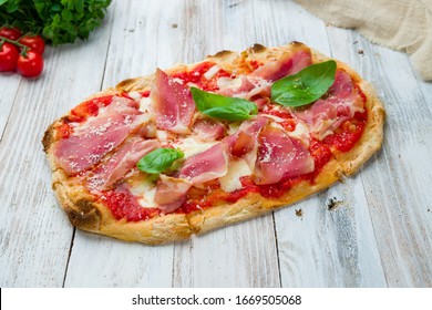 Pinsa With Parma Ham Rome Pizza On White Wooden Board