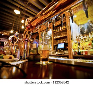 Pint Of Beer On A Bar In A Traditional Style Pub