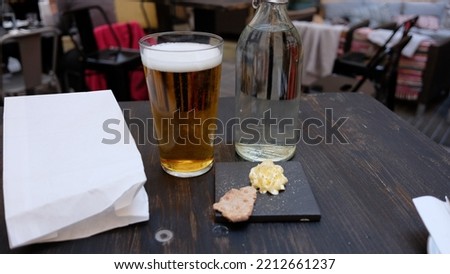 A pint of beer on a table