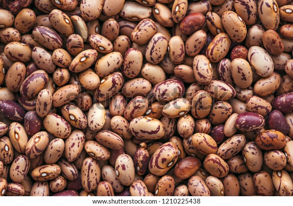 Pinto bean from above, top view of healthy legume
beans as background or
texture