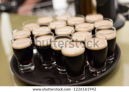 Pints of Guinness beer in the pub
