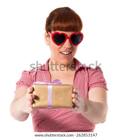 Pin-up woman holding a gift 