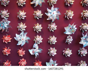 Pinwheel Pattern On Red Wall