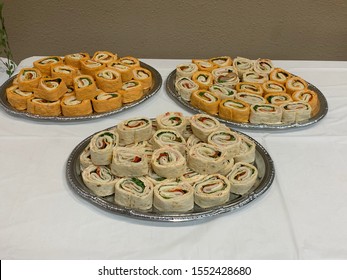 Pinwheels With Turkey, Cheese, Onion, Lettuce On A Tray