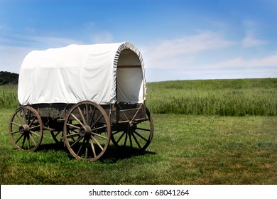 A pioneer covered wagon on the Prairie.