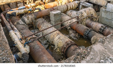 Pipe Break Underground. Repair Of Water Supply Networks. Replacement Of Old Pipelines As A Result Of An Accident. Laying Of The Pipeline Underground. A Trench For The Repair Of Communications.