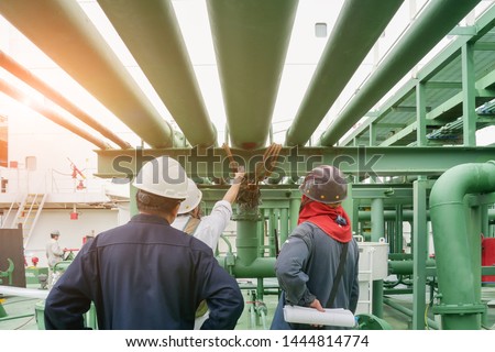 Pipe damage Engineer and supervisor Worker on Oil Tanker ship during inspection pipe damage and planing Maintenance or Repair of ship repair in shipyard.