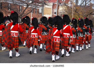 Pipe and drum band performing during annual Scottish Christmas Walk parade in City of Alexandria Old Town Washington DC area