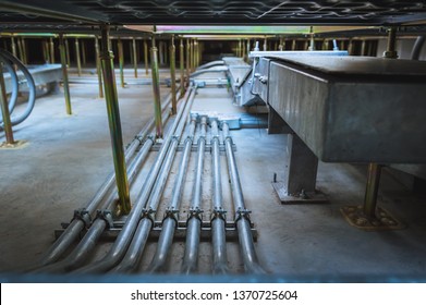 Pipe of electricity line on concrete floor. Electrical conduits system and cable tray  installed Under Raised floor  of server room in data center.