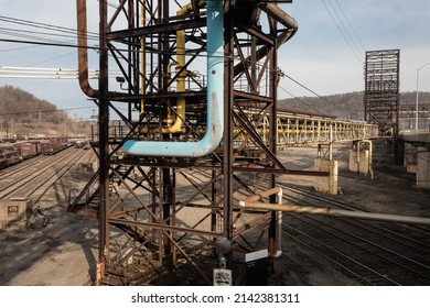 Pipe Infrastructure Over Industrial Train Yard In Rural West Virginia