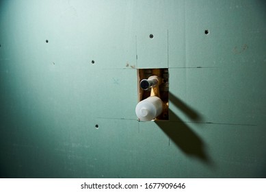 Pipe for installing a crane in a drywall wall
