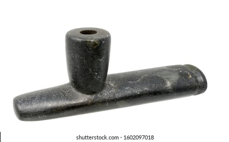 Pipe of the North American Indians made of dark soapstone isolated on white