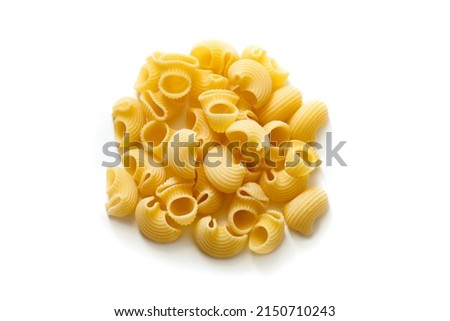 pipe rigate pasta isolate on white, italian pipe shaped pasta from durum wheat