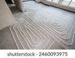 Pipe system of floor heating mounted in residential building under construction