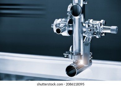 Pipelines From Stainless Steel, A System For Pumping Liquids Or Milk For The Food Industry. Abstract Industrial Background.