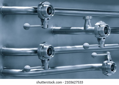 Pipelines From Stainless Steel, A System For Pumping Liquids Or Milk For The Food Industry. Abstract Industrial Background.