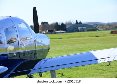 Piper Cherokee, Glistening In The Sunshine As It Awaits Its Trip Back To Its Home Base....