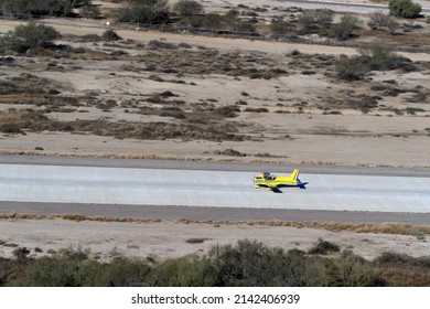 Piper Plane In Desert Airport Taking Off