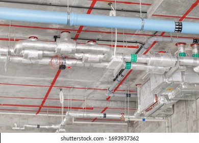 Pipes at the ceiling in the building, industrial infrastructure