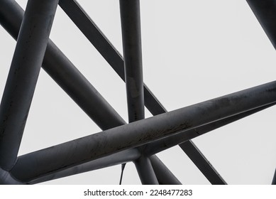 Pipes in the city. Modern scaffolding at a construction site. metallic grey structure.  - Shutterstock ID 2248477283