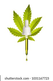 Pipette with a droplet hemp oil on cannabis leaf background