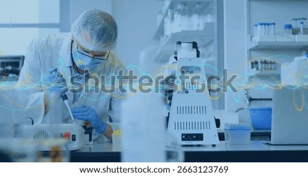 Pipetting scientist transferring samples with micropipette at lab bench, with tube rack. Scientist, research, laboratory, biotech, equipment, innovation, precision