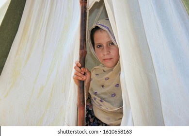 Pir Sabaq Village, KPK, Pakistan. September 6, 2010: A Poor Girl Looking From Her Camp. Victim Of Flood In Pakistan.