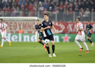 Piraeus, Greece Dec. 09, 2015. Arsenal'  Laurent Koscielny With The Ball During Soccer Match  Between Olympiacos FC And Arsenal At Karaiskakis Stadium .